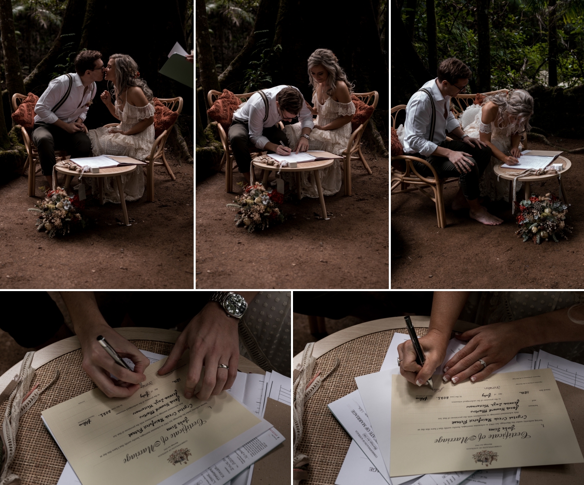 signing the wedding certificate underneath the fig tree on a rattan chair at Crystal creek rainforest retreat elopement with bohoelope