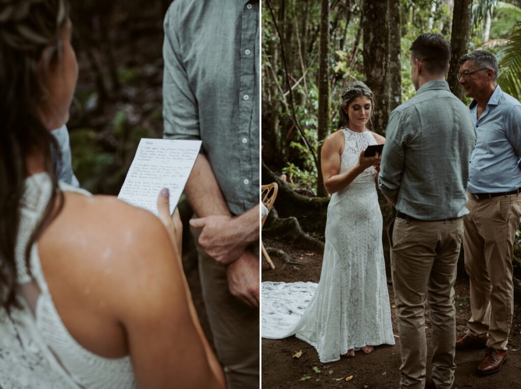 The bride and groom reading their wedding vows in the rain in the rainforest at Crystal creek rainforest retreat, NSW. CCRR