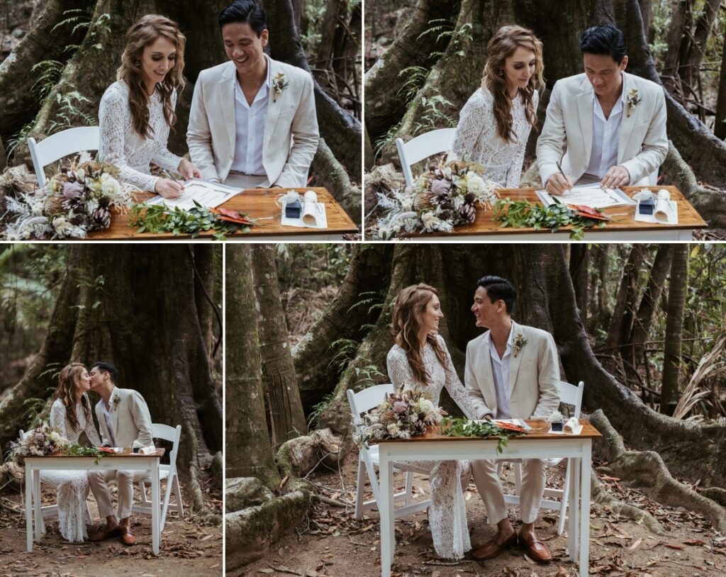 The happy couple signing their marriage certificate beneath the fig tree at crystal creek rainforest retreat. CCRR