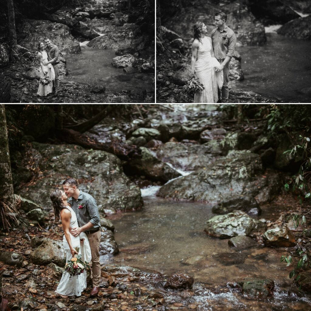 A rainy and wet bride and groom during their portrait session after the ceremony in the rainforest by the creek at Crystal creek rainforest retreat, NSW. CCRR