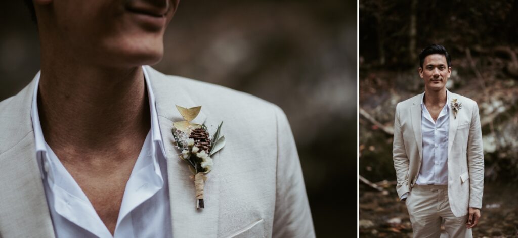 The groom wearing a cream linen suit with a white shirt and a close up detail of his buttonhole on the lapel of his jacket at crystal creek rainforest retreat. CCRR.