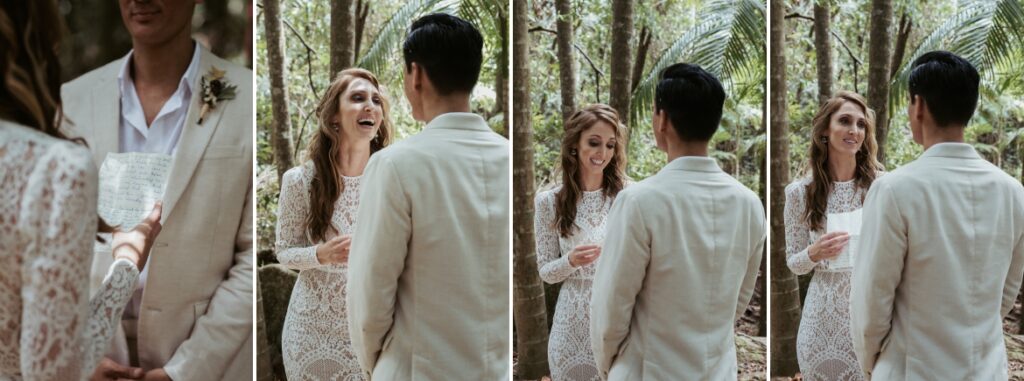 The bride laughs as she reads her vows to her groom at crystal creek rainforest retreat. CCRR