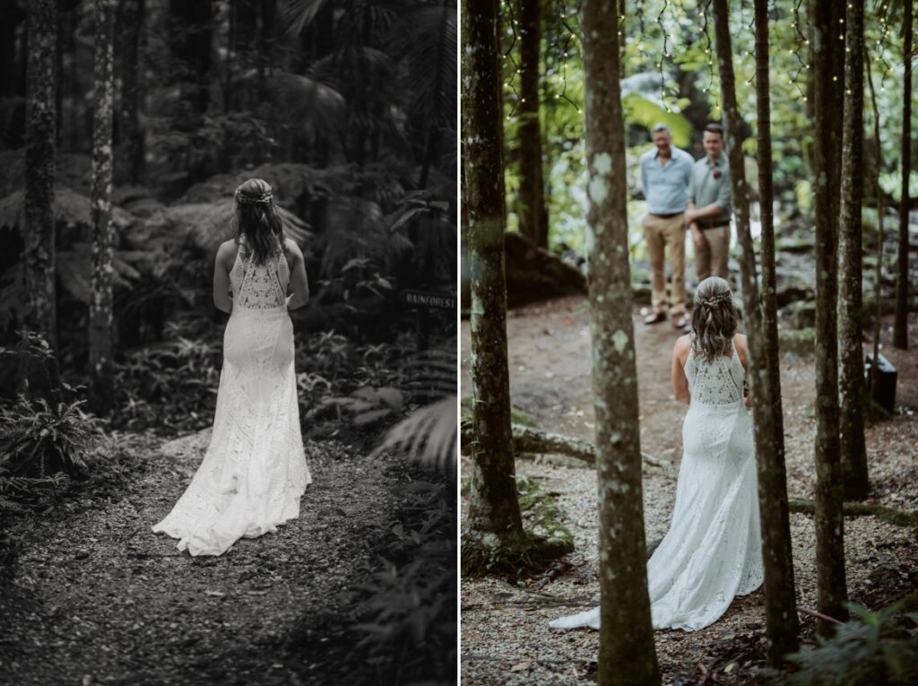 The bride walking towards her groom beneath the fig tree at crystal creek rainforest retreat, NSW. CCRR